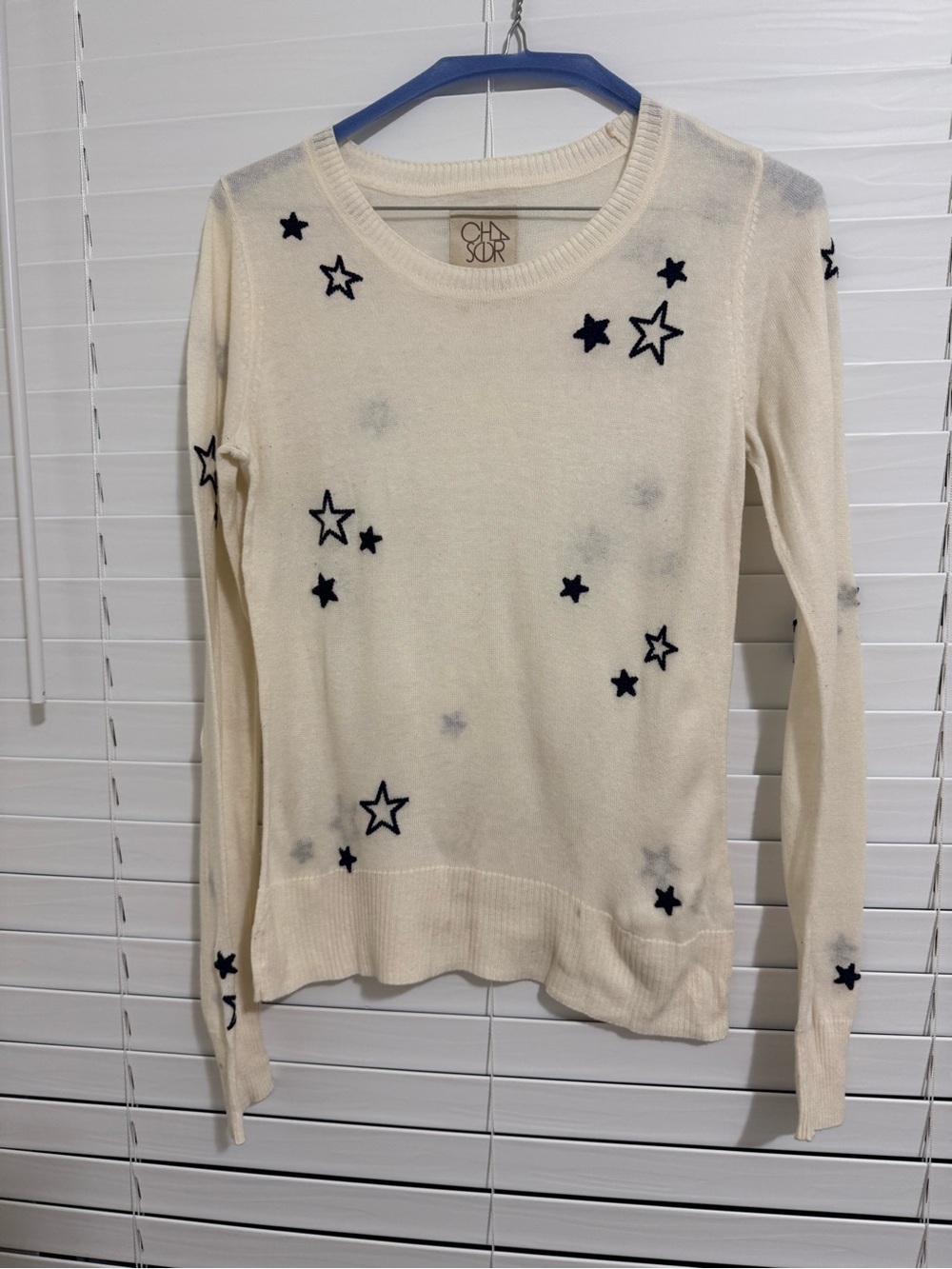 Chaser Cream Sweater with Black Star Embroidery